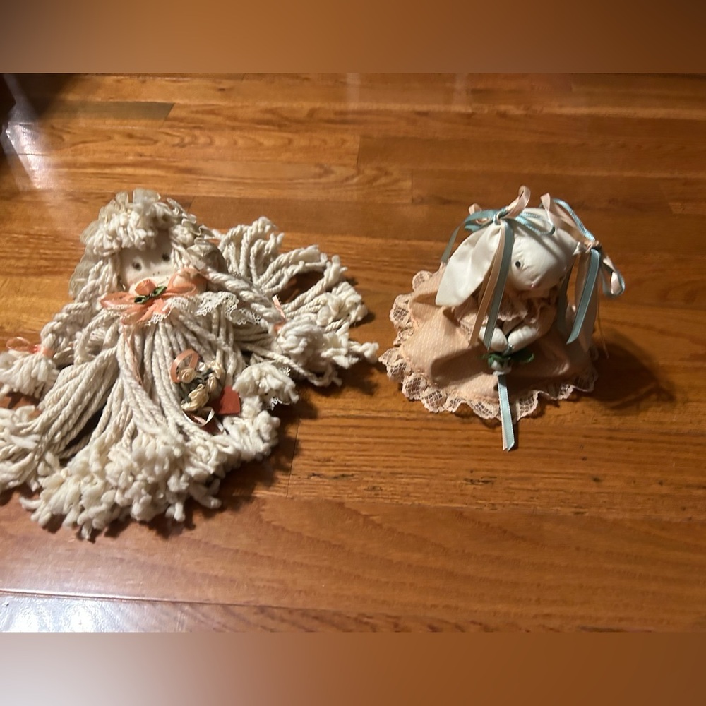 Vintage handmade dolls. A mop doll and an air freshener cover rabbit doll.